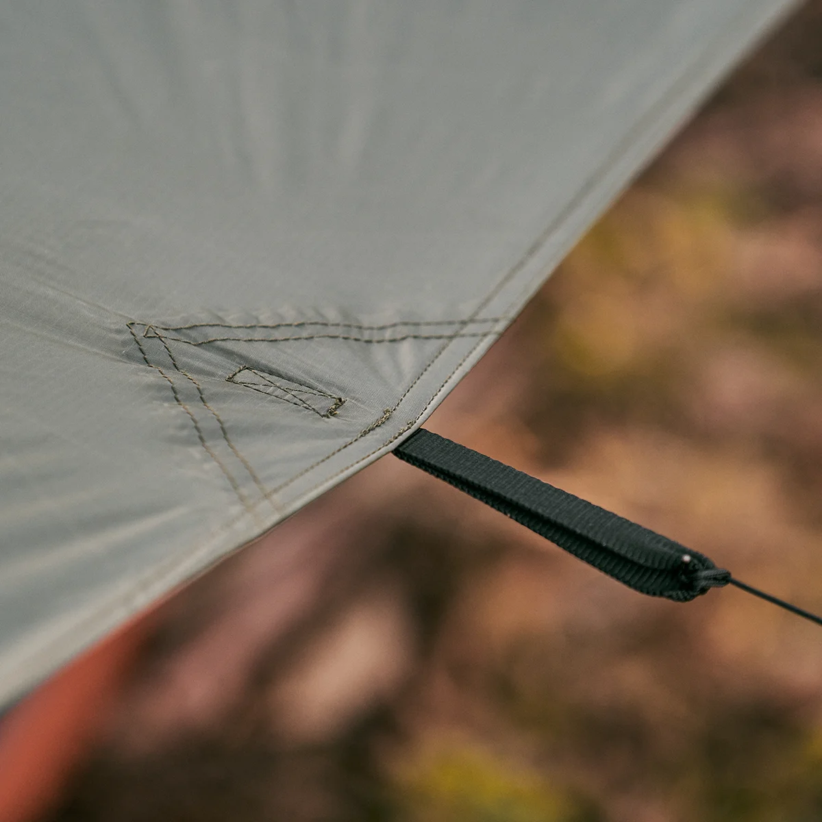 Close up image showing details of reinforced tie-out points and stitching